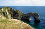 The rock arch of Durdle Door on the Dorset Coast is a popular visitor attraction.