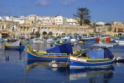 Traditional fishing boats, or ‘luzzu’, moored in the harbour at Marsaxlokk.