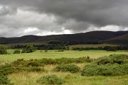 Dark clouds plunge Cross Fell into shadow in this view from the Vale of Eden.